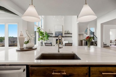 This is a MODEL HOME.  You will want to see this gorgeous brand on Heritage Park Golf Course in Kansas - for sale on GolfHomes.com, golf home, golf lot