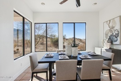 Stunning 5-Bedroom Home with Breathtaking Mountain Views in on Estrella Mountain Ranch Golf Course in Arizona - for sale on GolfHomes.com, golf home, golf lot