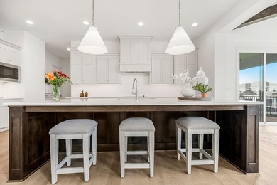 This is a MODEL HOME.  You will want to see this gorgeous brand on Heritage Park Golf Course in Kansas - for sale on GolfHomes.com, golf home, golf lot