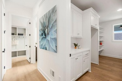 This is a MODEL HOME.  You will want to see this gorgeous brand on Heritage Park Golf Course in Kansas - for sale on GolfHomes.com, golf home, golf lot