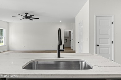 **NOW OFFERING $5,000 USE AS YOU CHOOSE** New construction on on Rock Creek Country Club in North Carolina - for sale on GolfHomes.com, golf home, golf lot