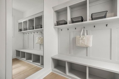 This is a MODEL HOME. You will want to see this gorgeous brand on Heritage Park Golf Course in Kansas - for sale on GolfHomes.com, golf home, golf lot