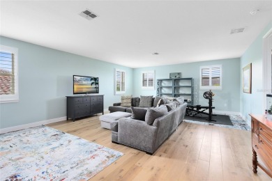 This stunning 5-bed, 5-bath Jones Homes masterpiece with water on Eagle Creek Golf Club in Florida - for sale on GolfHomes.com, golf home, golf lot