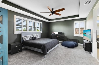 This stunning 5-bed, 5-bath Jones Homes masterpiece with water on Eagle Creek Golf Club in Florida - for sale on GolfHomes.com, golf home, golf lot