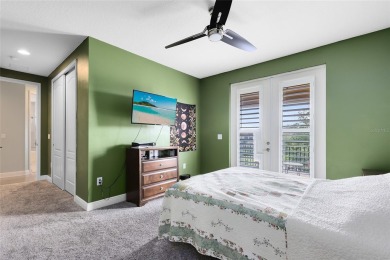 This stunning 5-bed, 5-bath Jones Homes masterpiece with water on Eagle Creek Golf Club in Florida - for sale on GolfHomes.com, golf home, golf lot
