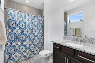 This stunning 5-bed, 5-bath Jones Homes masterpiece with water on Eagle Creek Golf Club in Florida - for sale on GolfHomes.com, golf home, golf lot