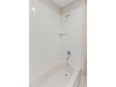 This is a MODEL HOME. You will want to see this gorgeous brand on Heritage Park Golf Course in Kansas - for sale on GolfHomes.com, golf home, golf lot