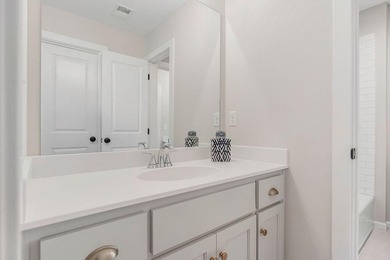 This is a MODEL HOME. You will want to see this gorgeous brand on Heritage Park Golf Course in Kansas - for sale on GolfHomes.com, golf home, golf lot