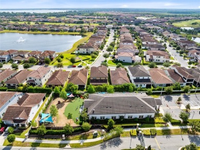 This stunning 5-bed, 5-bath Jones Homes masterpiece with water on Eagle Creek Golf Club in Florida - for sale on GolfHomes.com, golf home, golf lot