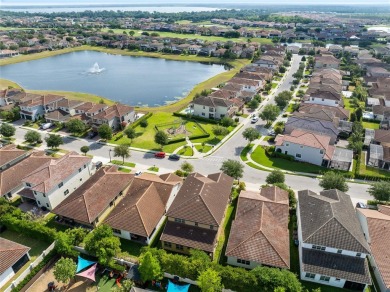 This stunning 5-bed, 5-bath Jones Homes masterpiece with water on Eagle Creek Golf Club in Florida - for sale on GolfHomes.com, golf home, golf lot