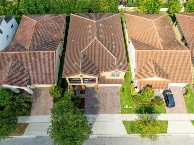 This stunning 5-bed, 5-bath Jones Homes masterpiece with water on Eagle Creek Golf Club in Florida - for sale on GolfHomes.com, golf home, golf lot