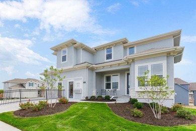 This is a MODEL HOME. You will want to see this gorgeous brand on Heritage Park Golf Course in Kansas - for sale on GolfHomes.com, golf home, golf lot