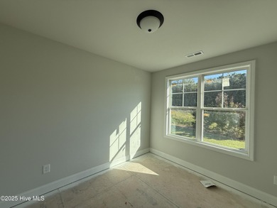 Premium lot! Don't miss this stunning new home in downtown on Riverwood Golf and Athletic Club in North Carolina - for sale on GolfHomes.com, golf home, golf lot