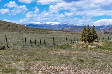 Dream of building your mountain retreat? This .25-acre, flat on Grand Elk Ranch and Club in Colorado - for sale on GolfHomes.com, golf home, golf lot