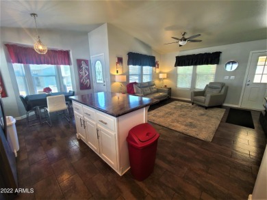 This 2-bedroom, 2-bathroom home features an open floor plan and on Viewpoint Golf Resort in Arizona - for sale on GolfHomes.com, golf home, golf lot