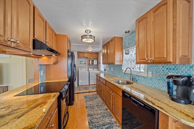 Under contract-accepting backup offers. Welcome home to easy on Pelican Pointe Golf and Country Club in Florida - for sale on GolfHomes.com, golf home, golf lot