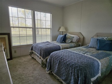 LAND-OWNED two-bedroom, two-bath home available in Zellwood on Zellwood Station Country Club in Florida - for sale on GolfHomes.com, golf home, golf lot