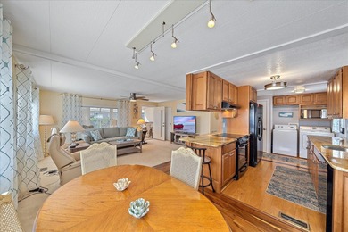 Under contract-accepting backup offers. Welcome home to easy on Pelican Pointe Golf and Country Club in Florida - for sale on GolfHomes.com, golf home, golf lot