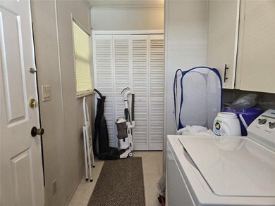 LAND-OWNED two-bedroom, two-bath home available in Zellwood on Zellwood Station Country Club in Florida - for sale on GolfHomes.com, golf home, golf lot