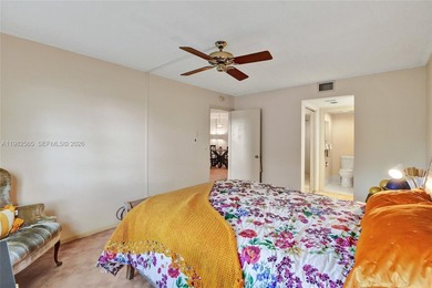 JUST SIT BACK, RELAX AND ENJOY THE VIEW OF THE CALMING WATER AND on Flamingo Lakes Country Club in Florida - for sale on GolfHomes.com, golf home, golf lot