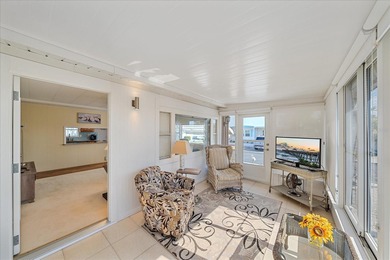 Under contract-accepting backup offers. Welcome home to easy on Pelican Pointe Golf and Country Club in Florida - for sale on GolfHomes.com, golf home, golf lot