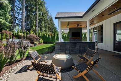 This custom home is located in the prestigious gated golf on Camas Meadows Golf Club in Washington - for sale on GolfHomes.com, golf home, golf lot