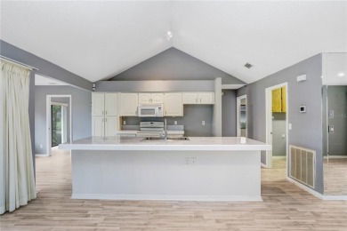 Featuring a soaring vaulted ceiling in the Great Room and on Sandpiper Golf Club in Florida - for sale on GolfHomes.com, golf home, golf lot