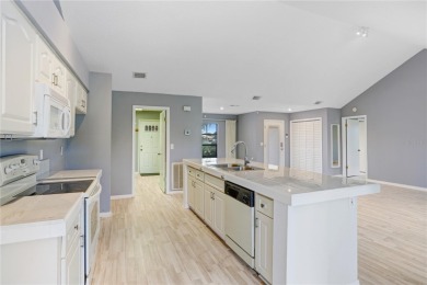 Featuring a soaring vaulted ceiling in the Great Room and on Sandpiper Golf Club in Florida - for sale on GolfHomes.com, golf home, golf lot