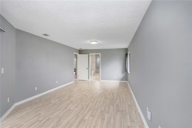 Featuring a soaring vaulted ceiling in the Great Room and on Sandpiper Golf Club in Florida - for sale on GolfHomes.com, golf home, golf lot