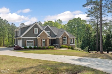 Welcome to your dream home in the highly sought-after gated on The Club River Forest in Georgia - for sale on GolfHomes.com, golf home, golf lot