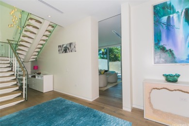 A remarkably private 4 bedroom, two-level home with its own 2 on Ala Wai Golf Course in Hawaii - for sale on GolfHomes.com, golf home, golf lot