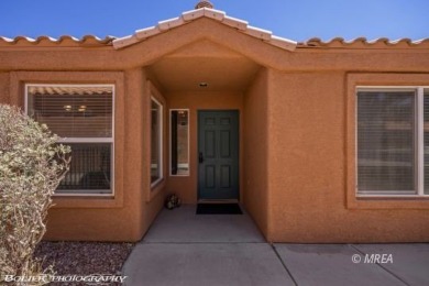 A resort style townhome overlooking the golf course driving on The Oasis Golf Club in Nevada - for sale on GolfHomes.com, golf home, golf lot