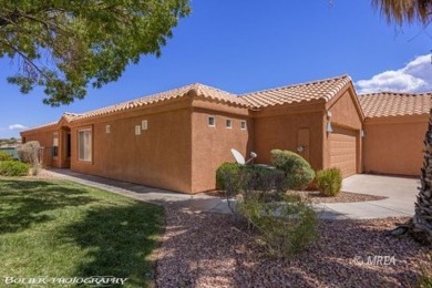 A resort style townhome overlooking the golf course driving on The Oasis Golf Club in Nevada - for sale on GolfHomes.com, golf home, golf lot