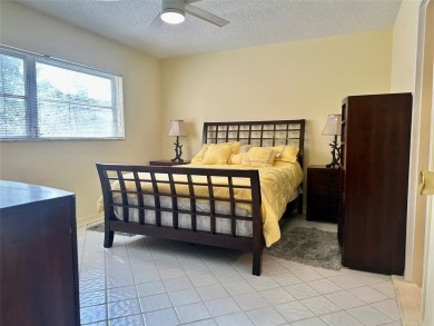 Discover easy South Florida living in this beautifully updated on Oriole Golf and Tennis Club in Florida - for sale on GolfHomes.com, golf home, golf lot