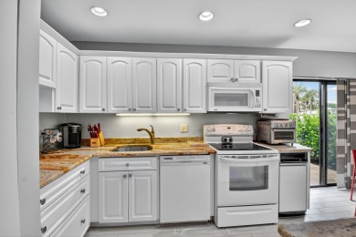 Welcome to your charming first-floor corner unit with beautiful on Hunters Run Golf and Country Club in Florida - for sale on GolfHomes.com, golf home, golf lot