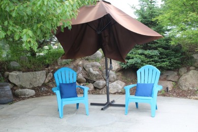 Relax & enjoy yourself. This charming 2004 cottage comes with on Marquette Trails Country Club in Michigan - for sale on GolfHomes.com, golf home, golf lot