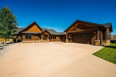 Welcome to 6 Donegal Drive -- a stunning custom log home tucked on The Powder Horn Golf Club - Mountain in Wyoming - for sale on GolfHomes.com, golf home, golf lot
