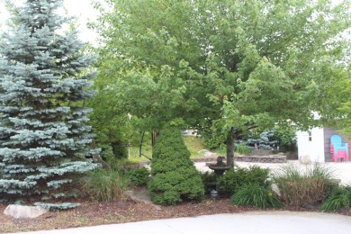 Relax & enjoy yourself. This charming 2004 cottage comes with on Marquette Trails Country Club in Michigan - for sale on GolfHomes.com, golf home, golf lot