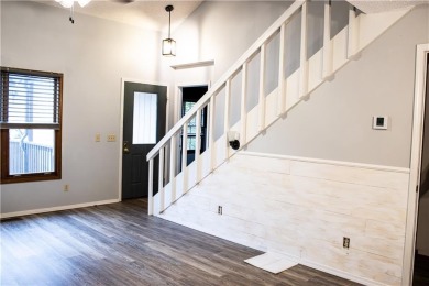 Enjoy relaxed lake living in this beautifully updated tri-level on Holiday Island Executive Golf Course in Arkansas - for sale on GolfHomes.com, golf home, golf lot