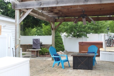 Relax & enjoy yourself. This charming 2004 cottage comes with on Marquette Trails Country Club in Michigan - for sale on GolfHomes.com, golf home, golf lot
