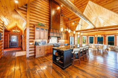 Welcome to 6 Donegal Drive -- a stunning custom log home tucked on The Powder Horn Golf Club - Mountain in Wyoming - for sale on GolfHomes.com, golf home, golf lot