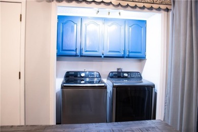 Enjoy relaxed lake living in this beautifully updated tri-level on Holiday Island Executive Golf Course in Arkansas - for sale on GolfHomes.com, golf home, golf lot