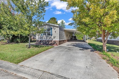 In this well-manicured and gated community of The Parks at Long on Long Bay Club in South Carolina - for sale on GolfHomes.com, golf home, golf lot