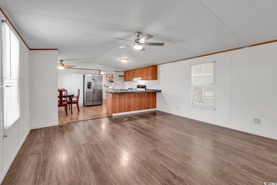 In this well-manicured and gated community of The Parks at Long on Long Bay Club in South Carolina - for sale on GolfHomes.com, golf home, golf lot