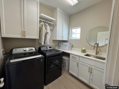 This beautifully updated 4-bedroom, 3-bathroom home at 3749 on  in Wyoming - for sale on GolfHomes.com, golf home, golf lot