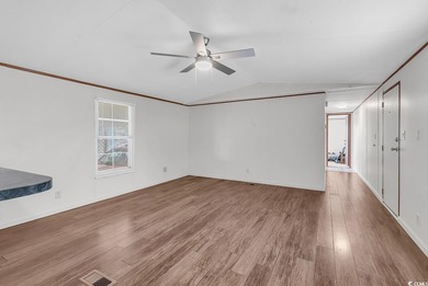 In this well-manicured and gated community of The Parks at Long on Long Bay Club in South Carolina - for sale on GolfHomes.com, golf home, golf lot