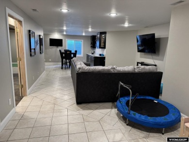 This beautifully updated 4-bedroom, 3-bathroom home at 3749 on  in Wyoming - for sale on GolfHomes.com, golf home, golf lot