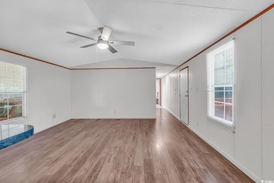 In this well-manicured and gated community of The Parks at Long on Long Bay Club in South Carolina - for sale on GolfHomes.com, golf home, golf lot