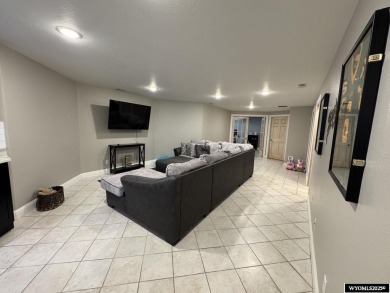 This beautifully updated 4-bedroom, 3-bathroom home at 3749 on  in Wyoming - for sale on GolfHomes.com, golf home, golf lot