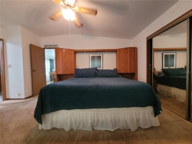 This very well-maintained pet free 3-bedroom 2 bath home in on Zellwood Station Country Club in Florida - for sale on GolfHomes.com, golf home, golf lot